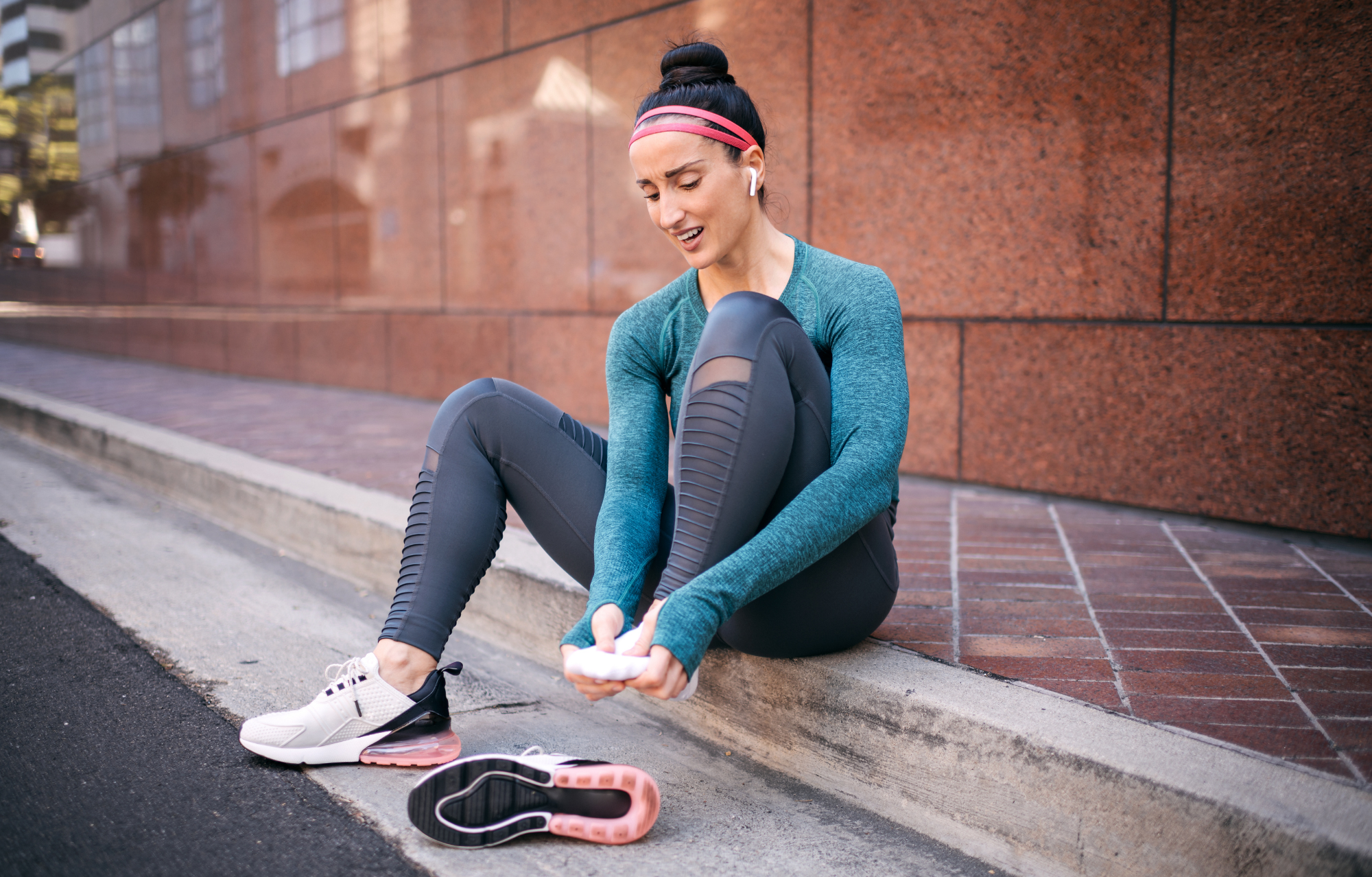 Woman experiencing foot muscle fatigue Woman experiencing foot muscle fatigue