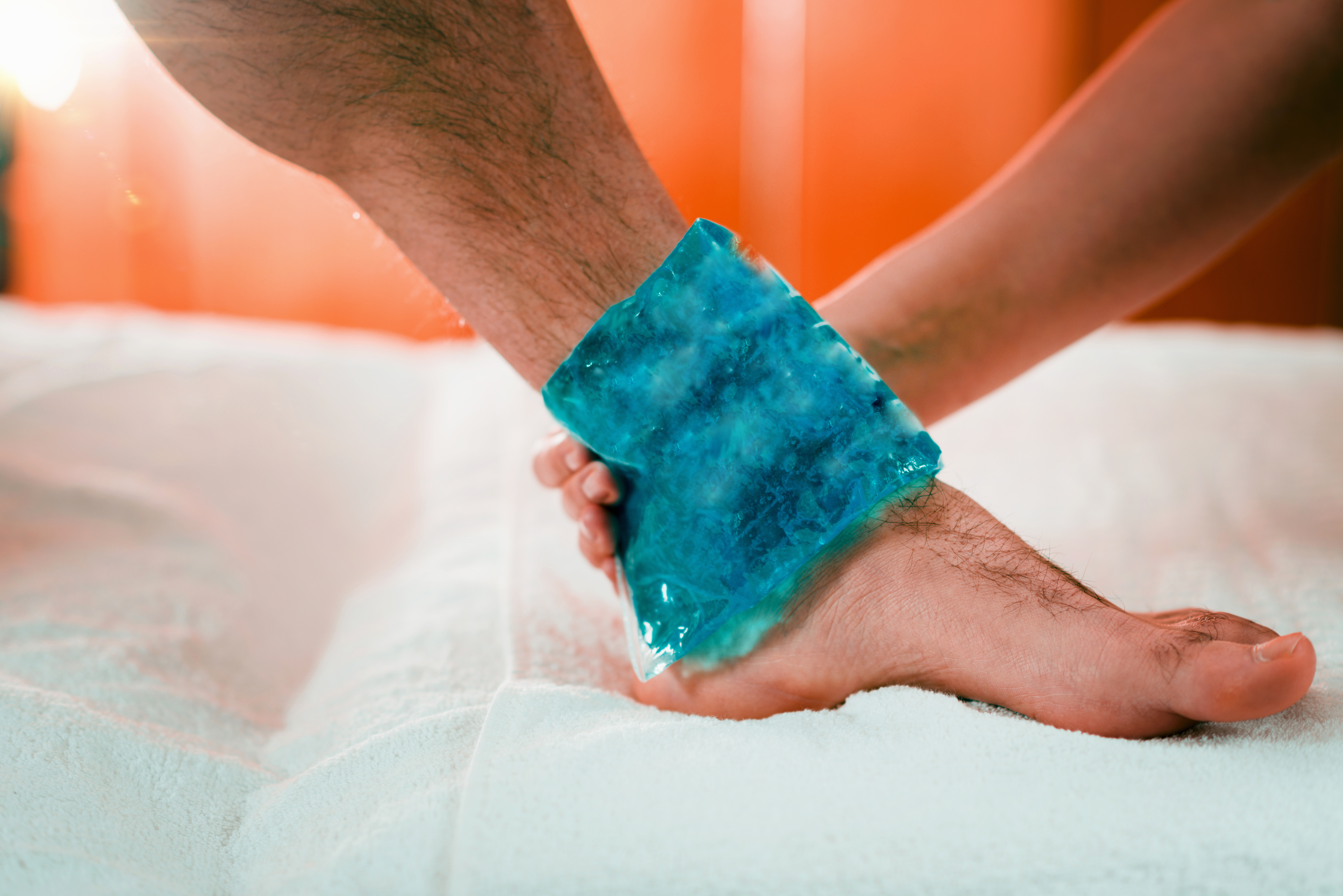 Close up of man's foot with cold compress. Close up of man's foot with cold compress.