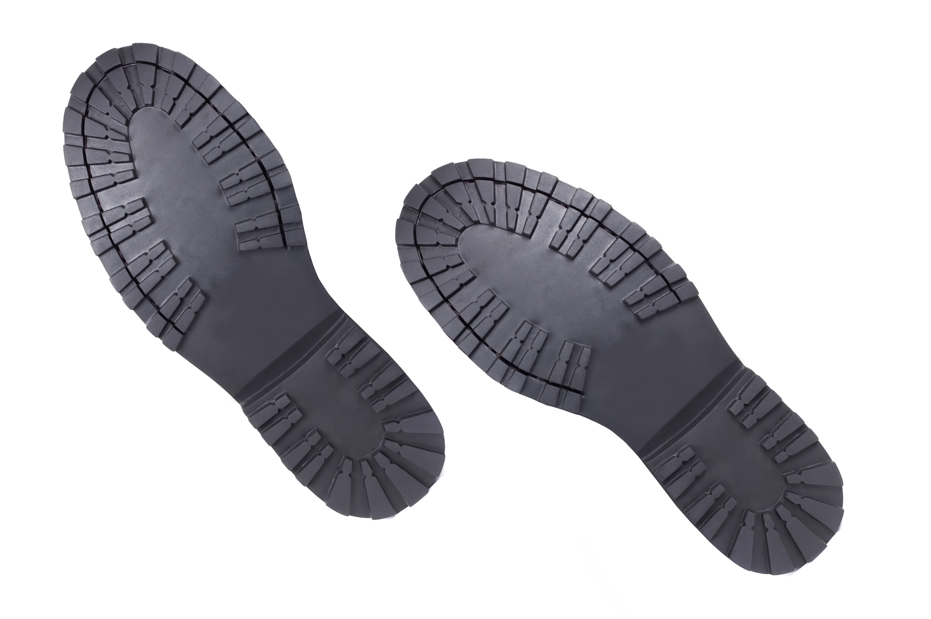 Close up of walking boots' soles Close up of walking boots' soles